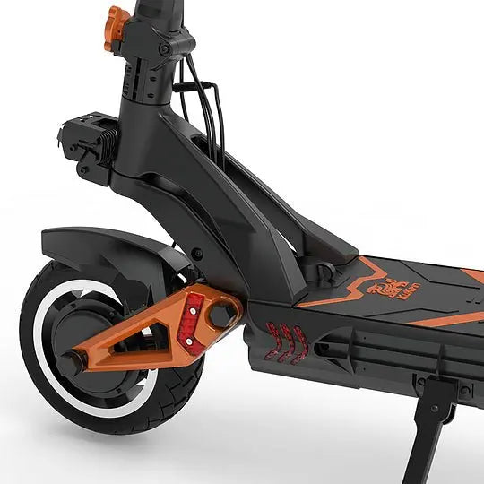 Close-up of KuKirin G3 Pro electric scooter front tire with deep tread pattern, disc brake system, and reinforced suspension fork for off-road performance